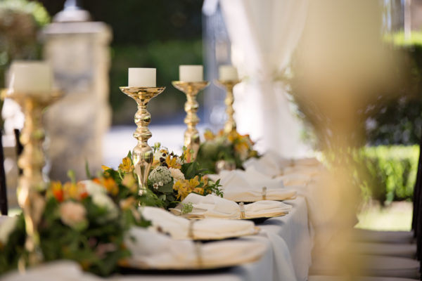 Candlesticks on a table set for dinner